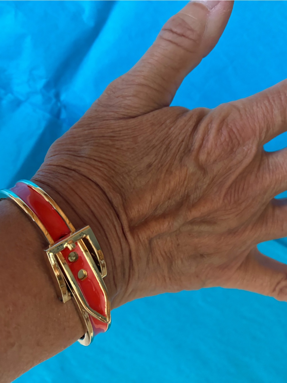 Gold-Tone Bracelet with Orange Enamel Buckle Accent
